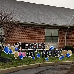 Building and Heroes at Work sign